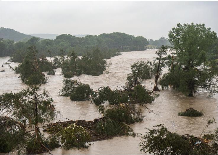 Texas man saves woman from flood